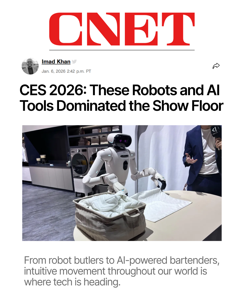 CNET coverage of CES 2026 featuring a white LG robot butler folding laundry on a table at the show.